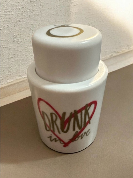 Other - White 'Grounded in Love' vacuum wine stopper with Red Heart Accent
1298